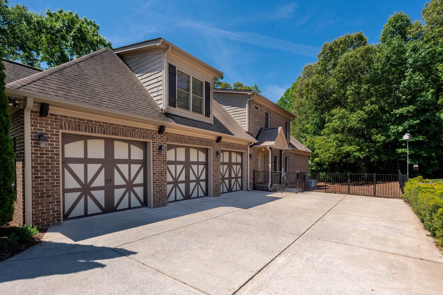 Side-entry three-car garage